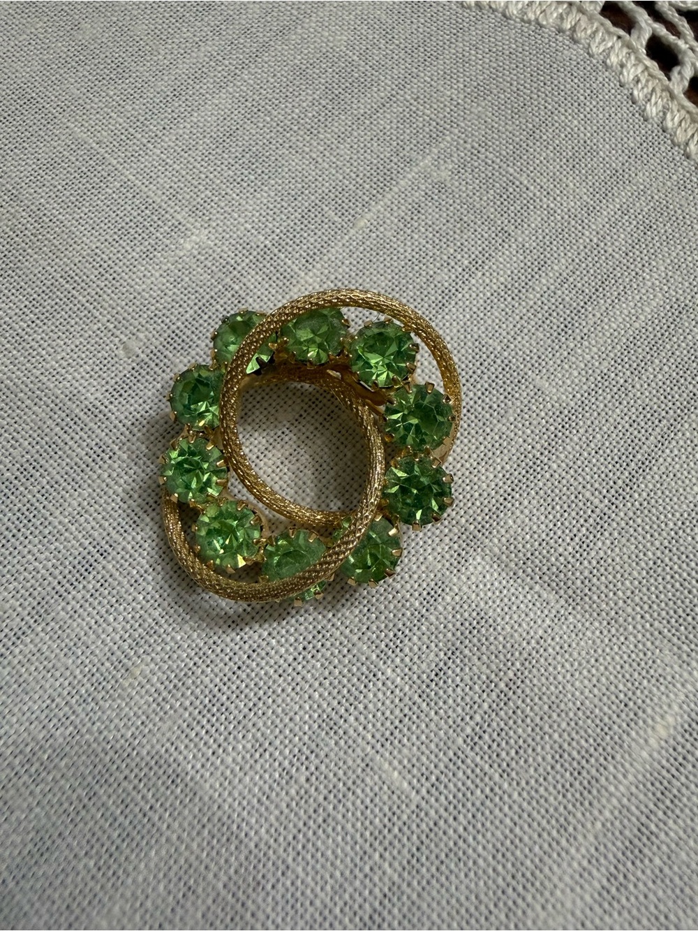 Vintage Gold-Tone Green Crystal Interlocking Circle Brooch
